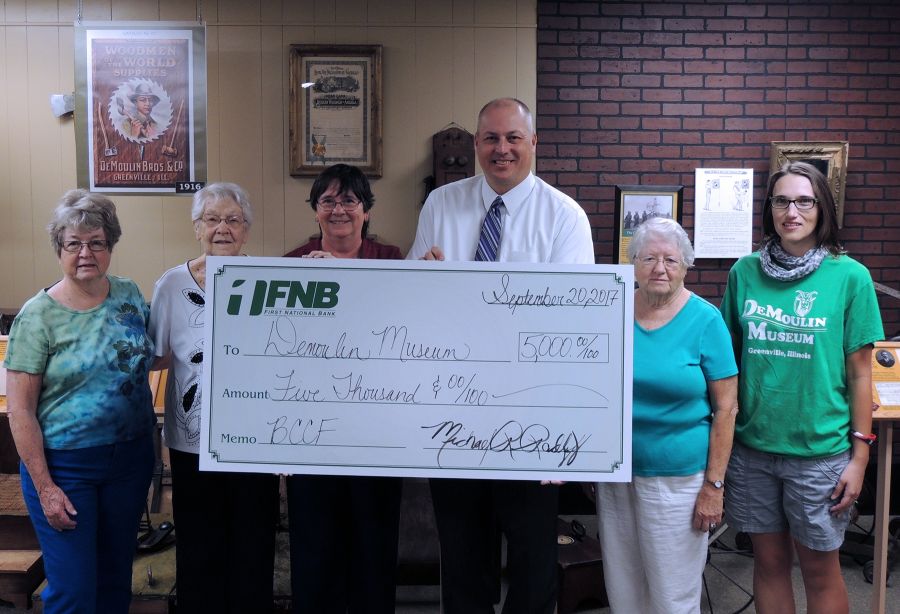 DeMoulin Museum volunteers participated in the check presentation